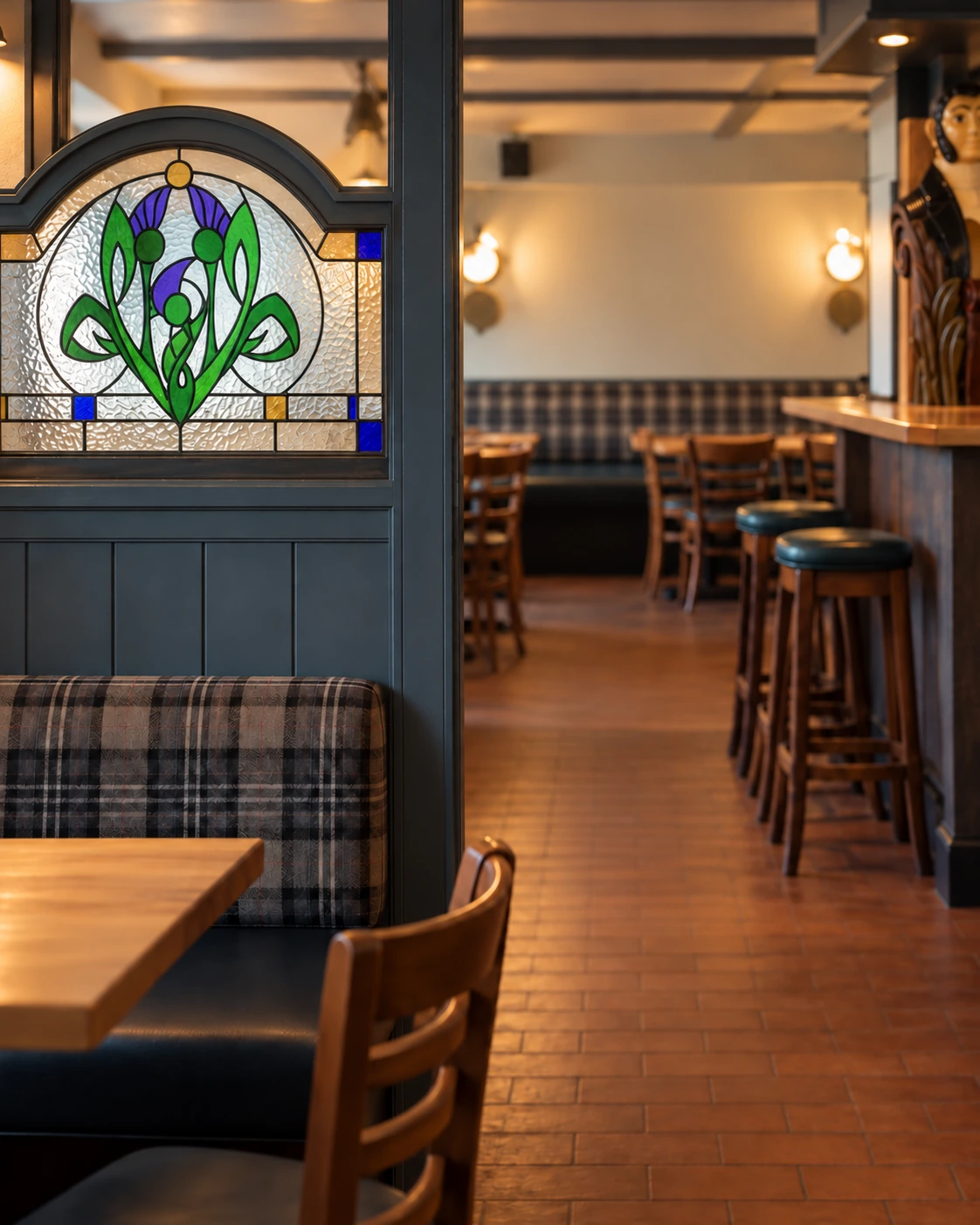 Decorative stained glass beside the seating area at Ardview Inn