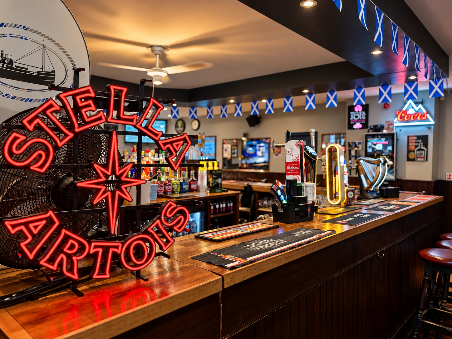 Stella Artois neon sign and bar counter at The Burgh Bar Dunoon