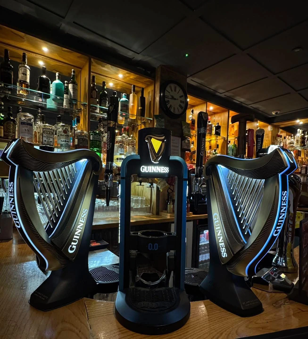 Draught beer taps along the bar at The Burgh Bar Partick